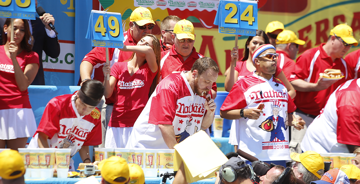 Group of people eating for a contest